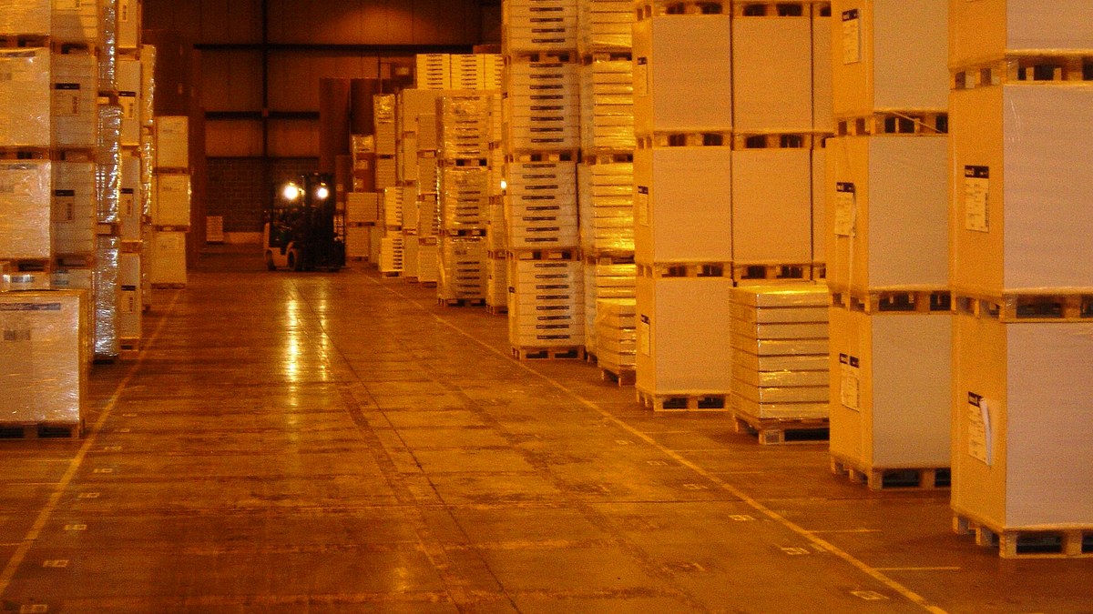 warehouse forklift handling palletized goods